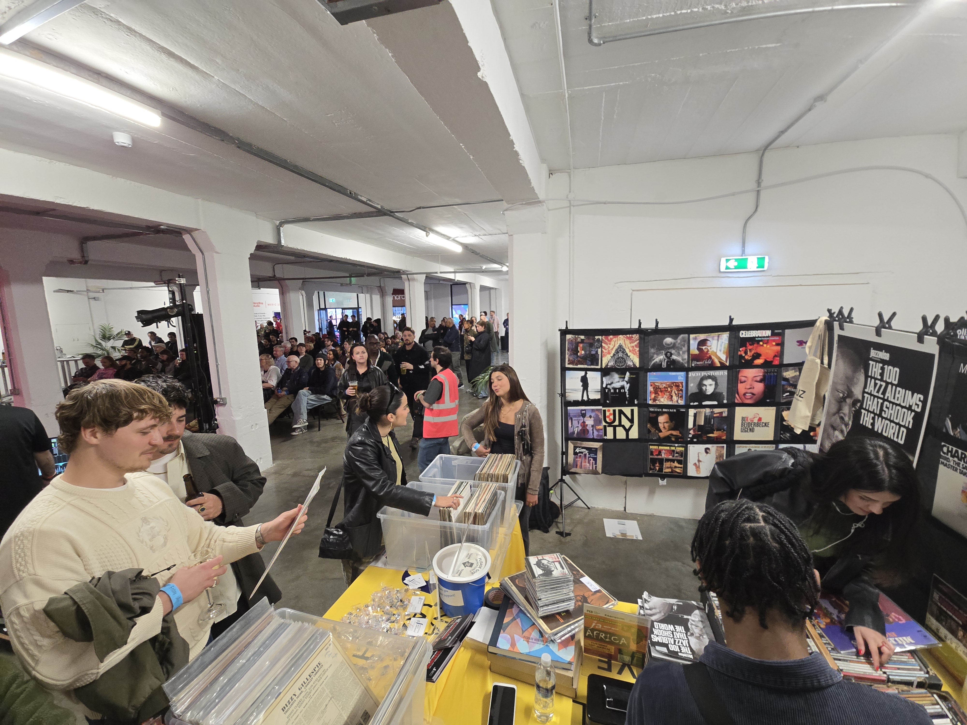 attendees of the Brick Lane Jazz Festival browse the National Jazz Archives po-up shop